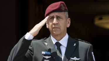 In this file photo taken on June 21, 2021, Israeli army Chief of Staff Aviv Kohavi salutes during a US official ceremony in his honour at the Pentagon in Washington, DC. (AFP)