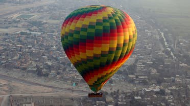 A hot-air balloon flies over the city of Luxor, south of Cairo, Egypt December 13, 2016. (Reuters)