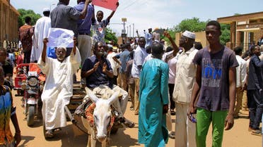 Sudan's Hausa people protest in El-Obeid, capital of North Kordofan state, on July 19, 2022 demanding justice for comrades killed in a deadly land dispute with a rival ethnic group in the country's south. (AFP)
