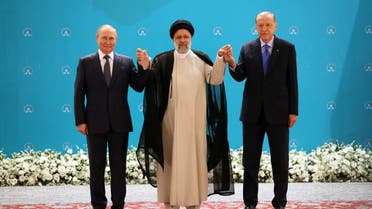 (L-R) Russian President Vladimir Putin, Iranian President Ebrahim Raisi and Turkish President Recep Tayyip Erdogan pose for a photo before a trilateral meeting on Syria in Tehran on July 19, 2022. (AFP)