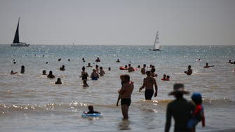 UN warns of worsening heat waves until 2060, as UK reports fires, record temperatures