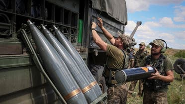 Shells are seen as Ukrainian service members prepare to shoot from a towed howitzer FH-70 at a front line, as Russia’s attack on Ukraine continues, in Donbas Region, Ukraine, on July 18, 2022. (Reuters)