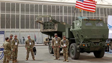 In this file photo taken on March 06, 2022 US military personnel stand by a M142 High Mobility Artillery Rocket System (HIMARS) during Saudi Arabia’s first World Defense Show, north of the capital Riyadh. (AFP)