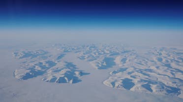 Glacial ice is seen from the window during a NASA flight to support the Oceans Melting Greenland (OMG) research mission above the east coast of Greenland, March 13, 2018. (File Photo: Reuters)