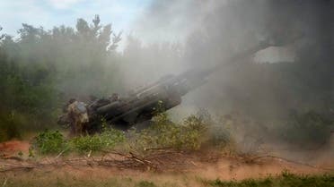 Ukrainian soldiers fire at Russian positions from a US-supplied M777 howitzer in Ukraine's eastern Donetsk region, June 18, 2022. (AP)