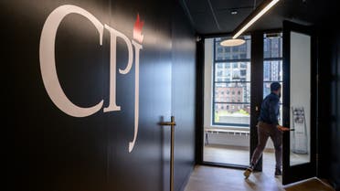 A staff member walks past a logo at the offices of the Committee to Protect Journalists (CPJ), in New York city on October 5, 2021. (File photo: AFP)