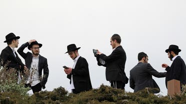 Orthodox Jews walk in Zaryadye park in central Moscow, Russia, on April 23, 2019. (Reuters)
