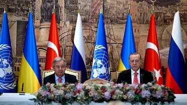  United Nations Secretary General Antonio Guterres (L) and Turkish President Recep Tayyip Erdogan (R) sit at the start of the signature ceremony of an initiative on the safe transportation of grain and foodstuffs from Ukrainian ports, in Istanbul, on July 22, 2022. (AFP)