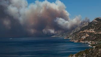 Tourist resort in Greece evacuated as Lesbos wildfire destroys homes