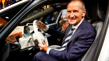 Herbert Diess, CEO of German carmaker Volkswagen AG, poses in an ID.3 pre-production prototype during the presentation of Volkswagen's new electric car on the eve of the International Frankfurt Motor Show IAA in Frankfurt, Germany. (File photo: Reuters)