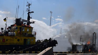 Firefighters work at a site of a Russian missile strike in a sea port of Odesa, as Russia’s attack on Ukraine continues, Ukraine, on July 23, 2022. (Reuters)