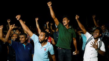 People dance as they celebrate the resignation of Sri Lanka’s President Gotabaya Rajapaksa at a protest site, amid the country’s economic crisis, in Colombo, Sri Lanka, on July 14, 2022. (Reuters)
