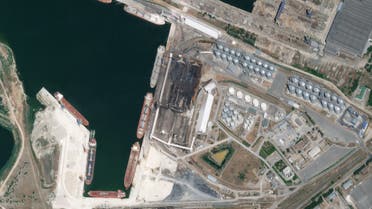 This handout satellite photo taken on June 7, 2022 and released on June 8, 2022, by Planet Labs PBC shows the aftermath of reported Russian shelling of the Nika-Tera grain storage terminal in the port of Mykolayiv. (Photo by Planet Labs PBC / AFP
