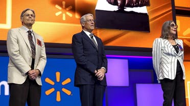 Walton family members (L to R) Jim, Rob and Alice Walton speak onstage at the Wal-Mart annual meeting in Fayetteville, Arkansas, June 5, 2015. (File photo: Reuters)