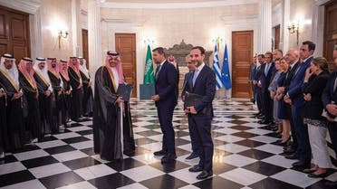Saudi and Greece officials sign an agreement to work on a data cable project. (SPA)
