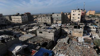 Israel accuses Hamas of hiding weapons depots near civilian buildings