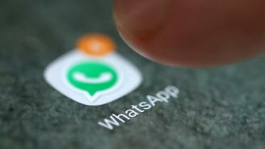 The WhatsApp app logo is seen on a smartphone in this picture illustration taken September 15, 2017. REUTERS/Dado Ruvic/Illustration