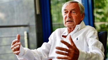 Erno Rubik, inventor of Hungary’s iconic Rubik’s cube gestures during an interview with Reuters in his home in Budapest, Hungary, on July 27, 2022. (Reuters)