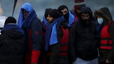 Migrants are brought ashore onboard a RNLI Lifeboat, after having crossed the channel, in Dover, Britain December 16, 2021. (File photo: Reuters)