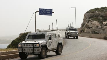 UN peacekeepers (UNIFIL) vehicles drive in Naqoura, near the Lebanese-Israeli border, southern Lebanon, April 25, 2022. (Reuters)