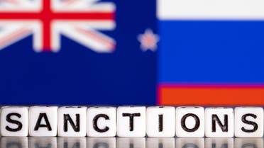 Plastic letters arranged to read Sanctions are placed in front the flag colors of New Zealand and Russia in this illustration taken February 28, 2022. (File photo: Reuters)