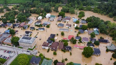 Aerial view of homes submerged under flood waters from the North Fork of the Kentucky River in Jackson, Kentucky, on July 28, 2022. (AFP)