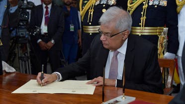 Ranil Wickremesinghe is sworn in as new president of Sri Lanka by Chief Justice Jayantha Jayasuriya at the parliament, amid the country's economic crisis, in Colombo, Sri Lanka July 21, 2022. (Reuters)