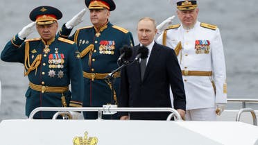 Russia's President Vladimir Putin, Defence Minister Sergei Shoigu and head of the Russian navy Admiral Nikolai Yevmenov attend a parade marking Navy Day in Saint Petersburg, Russia July 31, 2022. (Reuters)