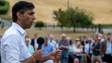 Rishi Sunak, Conservative Party leadership candidate and MP, speaks to a crowd during his campaigning at Manor Farm, on July 30, 2022 in Ropley near Winchester, England. (Reuters)