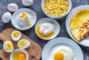 Differently cooked eggs. (Stock Image)