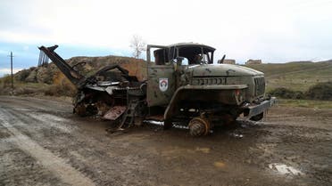FILE PHOTO: A view shows a damaged truck belonging to ethnic Armenian forces in an area that came under the control of Azerbaijan's troops following a military conflict over Nagorno-Karabakh, in Jabrayil District, December 7, 2020. Picture taken December 7, 2020. REUTERS/Aziz Karimov/File Photo