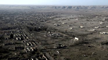 This aerial view shows ruins of the village of Zangilan, Azerbaijan, on January 5, 2021, in an area recaptured by Azerbaijan in October 2020 during a six-week war with Armenia over breakaway region of Nagorno-Karabakh. (AFP)