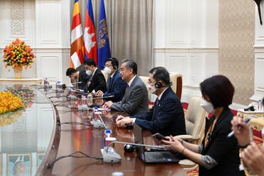 Chinese Foreign Minister Wang Yi speaks during a meeting with Cambodia's Prime Minister Hun Sen in Phnom Penh, Cambodia, on August 3, 2022. (Reuters)