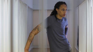 U.S. basketball player Brittney Griner, who was detained at Moscow's Sheremetyevo airport and later charged with illegal possession of cannabis, stands inside a defendants' cage before the court's verdict in Khimki outside Moscow, Russia August 4, 2022. (Reuters)