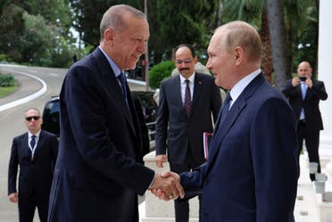 Russian President Vladimir Putin welcomes Turkish President Tayyip Erdogan during a meeting in Sochi, Russia August 5, 2022. (Reuters)
