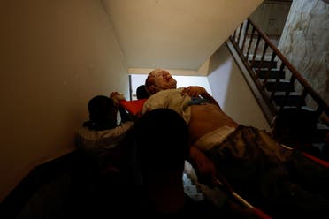 Emergency responders evacuate an injured person after an explosion in Gaza City August 5, 2022. (Reuters)