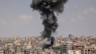 Smoke billows from an Israeli air strike in Gaza City on August 6, 2022. (AFP)