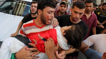 Mourners carry the body of Palestinian girl Alaa Qadoum during her funeral, in Gaza City August 5, 2022. (Reuters)