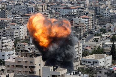 Flame and smoke rise during an Israeli air strike, amid Israel-Gaza fighting, in Gaza City August 6, 2022. (Reuters)
