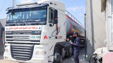 A fuel truck enters the Gaza Strip through the Kerem Shalom crossing with Israel, in Rafah in the southern Palestinian enclave following a truce, on August 8, 2022. (AFP)