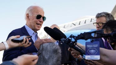 US President Joe Biden talks to reporters while boarding Air Force One, August 8, 2022. (Reuters)