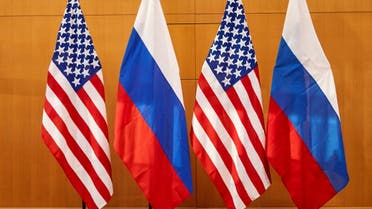 Russian and U.S. flags are pictured before talks between Russian Deputy Foreign Minister Sergei Ryabkov and U.S. Deputy Secretary of State Wendy Sherman at the United States Mission in Geneva, Switzerland January 10, 2022. (Reuters)