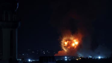 Flame and smoke rise from the site of an Israeli airstrike in Khan Yunis in the southern Gaza Strip on August 7, 2022 shortly before a ceasefire. (AFP)