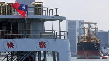 A Taiwan flag flutters on a ferry boat in Kaohsiung, Taiwan, on August 5, 2022. (Reuters)