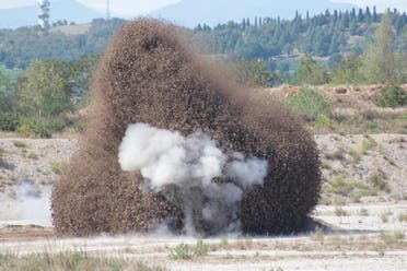 A World War Two bomb discovered in the dried-up river Po is detonated by 10th Engineer Regiment of Italian Army in Medole, Italy, August 7, 2022. (Reuters)