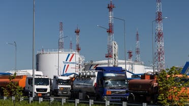 Petrol trucks are parked near oil tanks at Volodarskaya LPDS production facility owned by Transneft oil pipeline operator in the village of Konstantinovo in the Moscow region, Russia, on June 8, 2022. (Reuters)