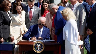US President Joe Biden signs the CHIPS and Science Act of 2022 at the White, August 9, 2022. (Reuters)