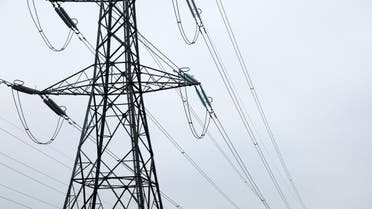 Electricity pylons are seen in Wellingborough, Britain, March 30, 2022. (Reuters)
