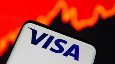 Smartphone with Visa logo is seen in front of displayed stock graph in this illustration taken, July 15, 2021. REUTERS/Dado Ruvic/Illustration
