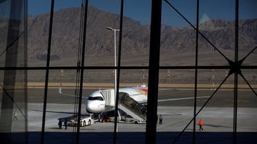 A plane is reflected in the facade of the Ramon International Airport after an inauguration ceremony for the new airport, just outside the southern Red Sea resort city of Eilat, Israel, on January 21, 2019. (Reuters)